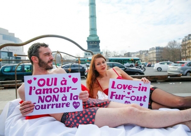 PHOTOS: Loved-Up Couple Go to Bed in the Middle of Paris With Fur-Free Message