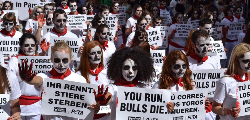 Death runners protest the Running of the Bulls