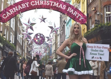 Santa’s Little Helper Has a Message for Carnaby Street Shoppers