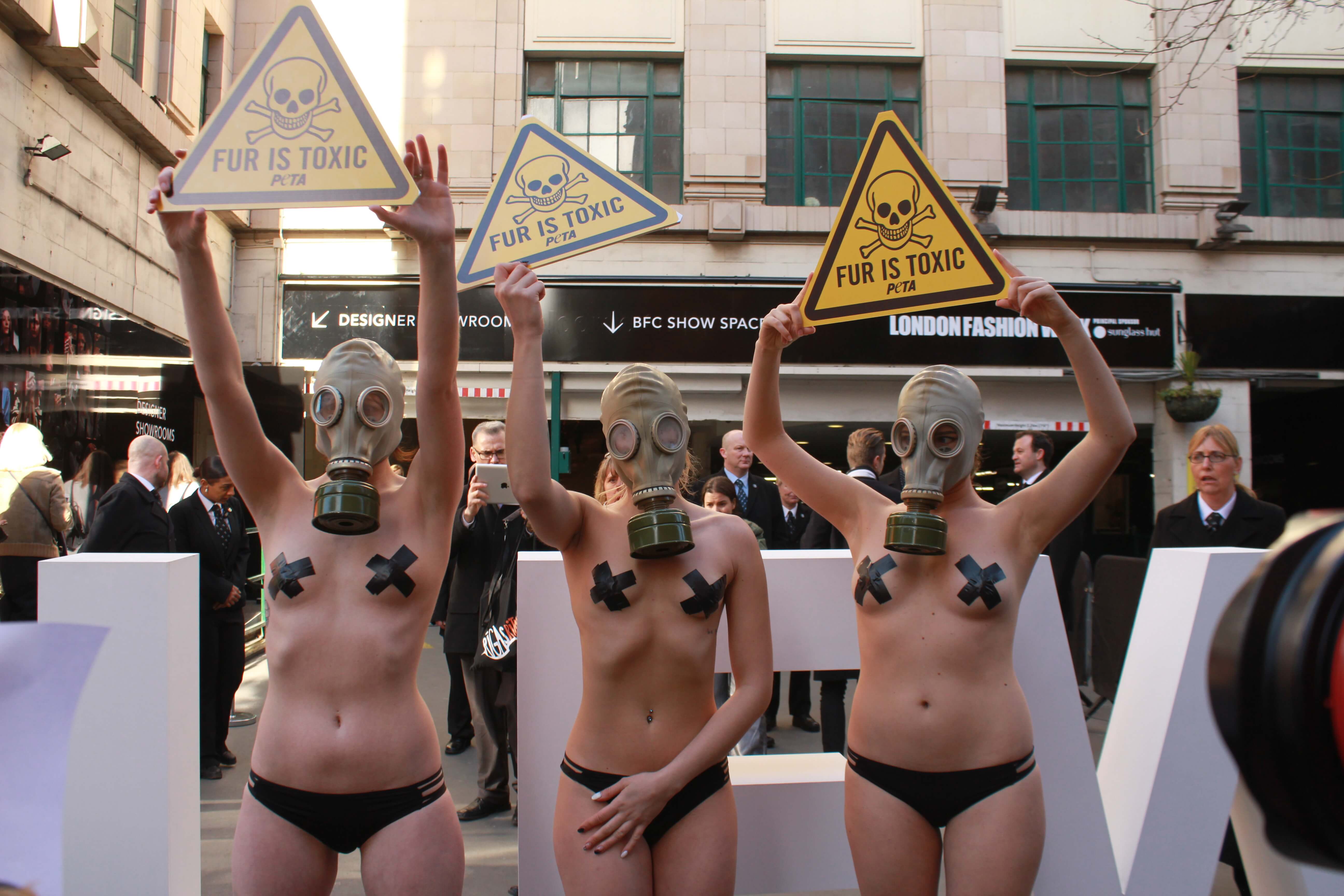 Fur is Toxic: Nearly Nude Models Wearing Gas Masks Crash London Fashion Wee...