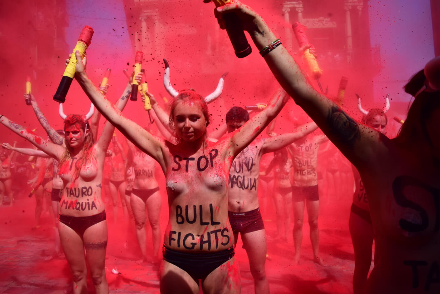 Nearly Naked Edinburgh Woman Fills Sky With 'Blood' to Highlight Torture of  Bulls in Pamplona - Media Centre - PETA UK