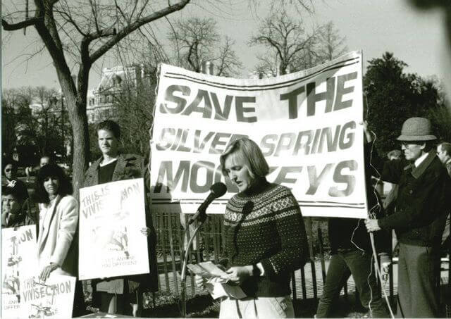 Ingrid with save the monkeys banner