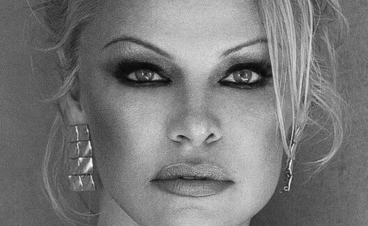 Black and white photo of Pamela Anderson