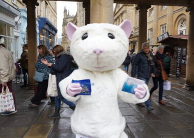 PETA ‘Rat’ Gives Out Free Face Masks – With a Message