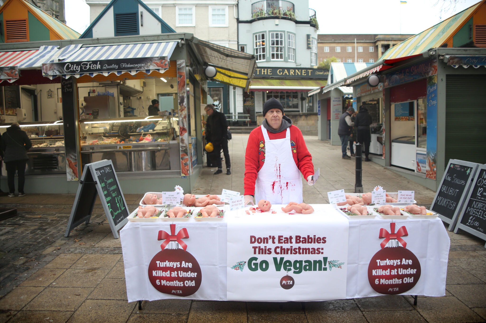 PETA ‘Butcher’ Serves Up ‘British FreeRange Babies’ Ahead of Christmas