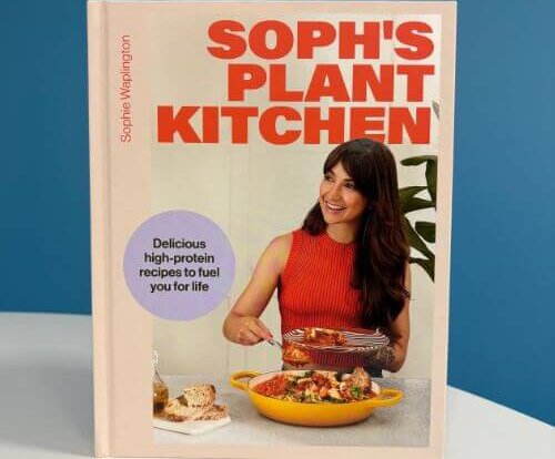 Vegan cookbook Soph's Plant Kitchen on a white table in front of a blue wall