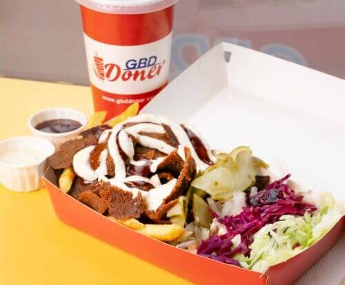 A vegan kebab from GBD DOner featuring plant-based meat, salad, and sauce