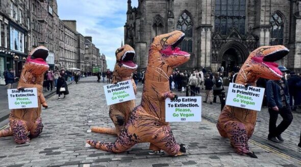 ‘Stop Eating to Extinction’: Vegan ‘Dinosaurs’ Charge Through Edinburgh