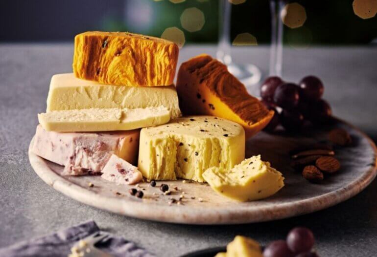 A plate full of dairy-free cheeses from the Aldi vegan cheeseboard