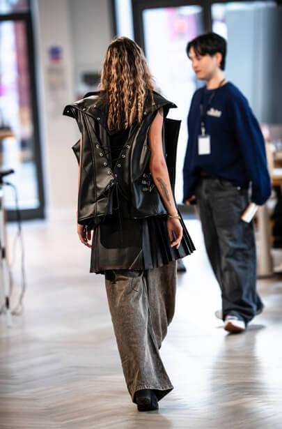 A model wearing cactus leather on a runway