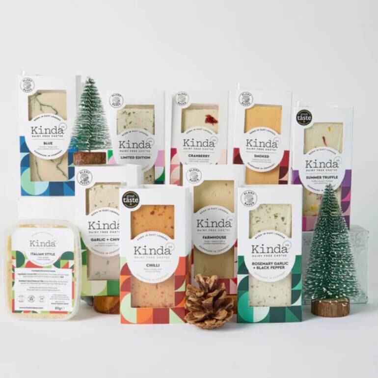 A Christmas vegan cheese selection from Kinda Co in front of a white background