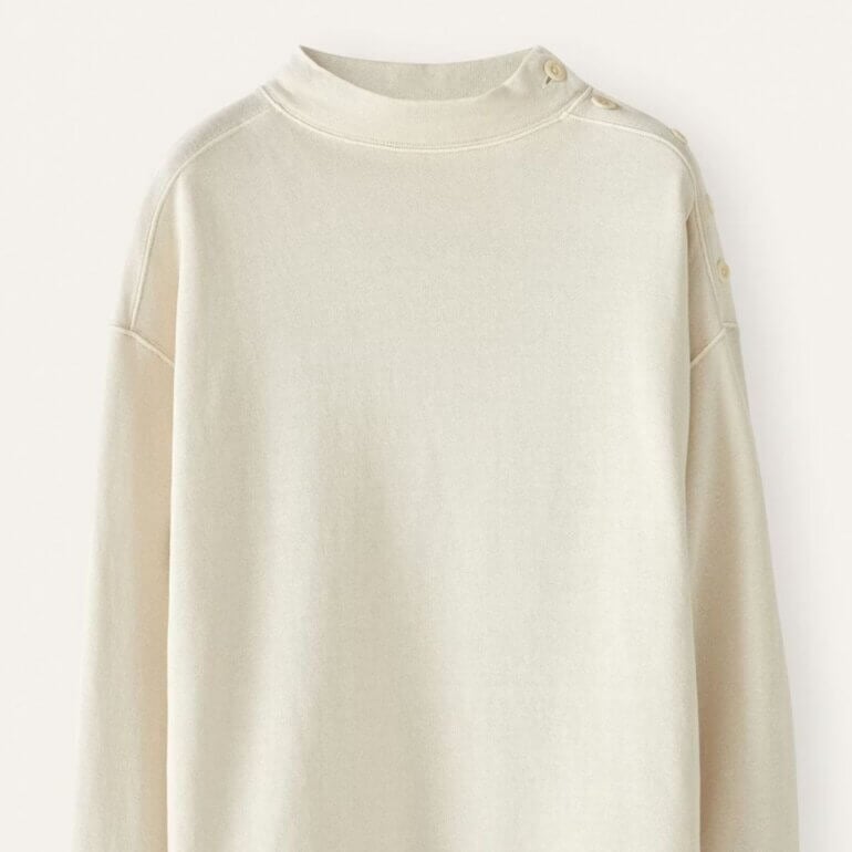 A white cotton and jemp jumper with button detail from Poetry