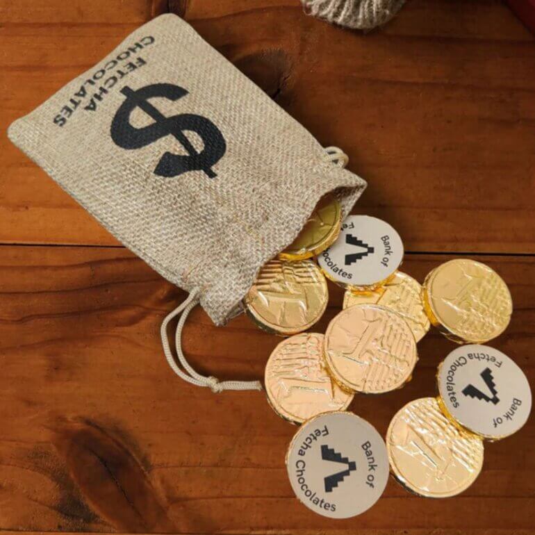 A bag of vegan chocolate coins from Fetcha Chocolates
