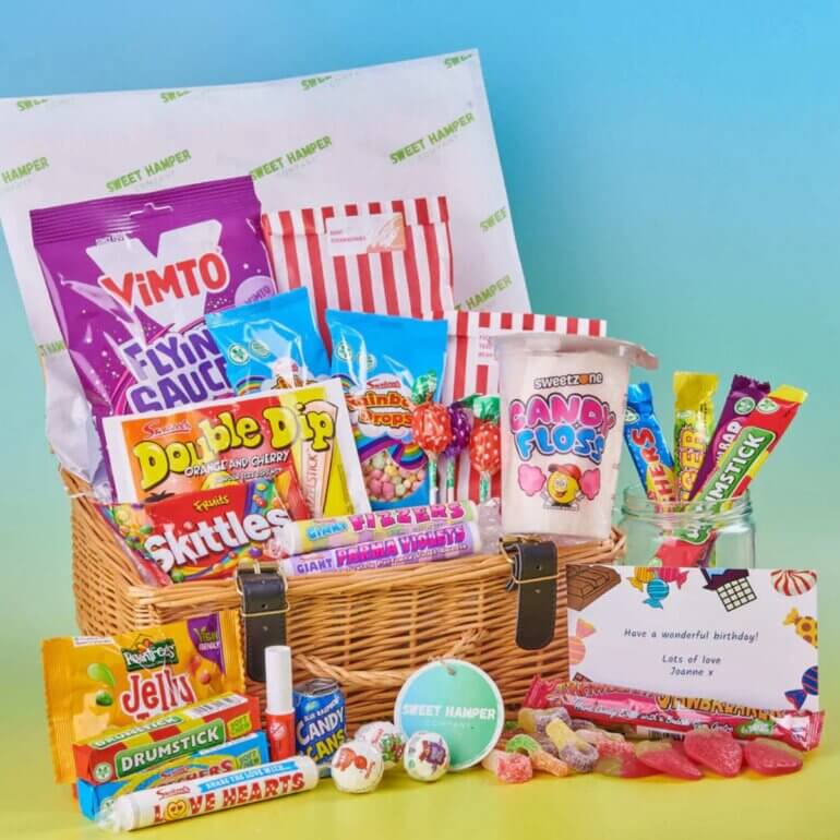 A vegan sweet hamper featuring Refresher's, Parma Violets, and more