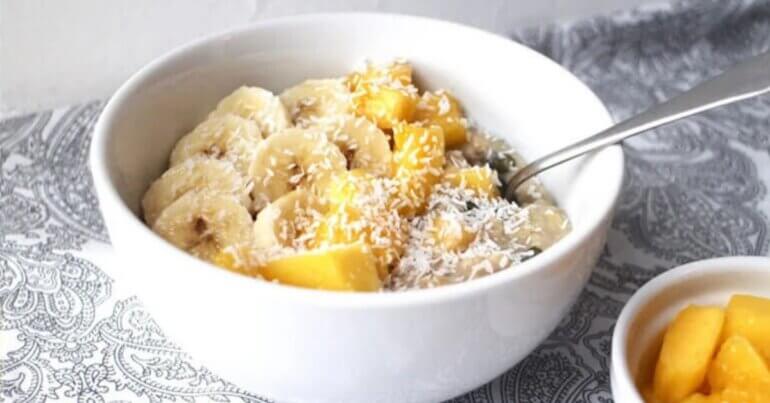 Vegan porridge with banana, coconut, and mango