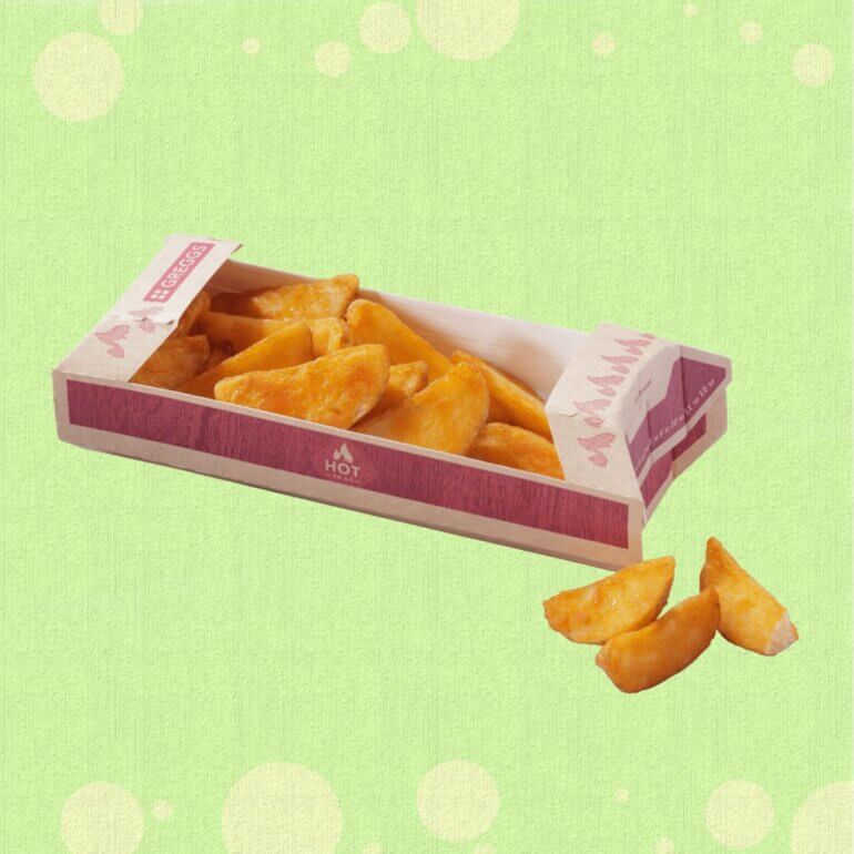 Greggs Southern Fried Potato Wedges in front of a green background