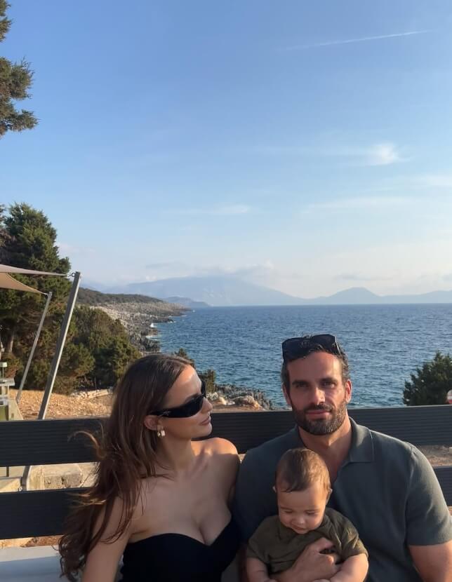 Lucy Watson with her husband James Dunmore and their vegan son Willoughby posing by the sea