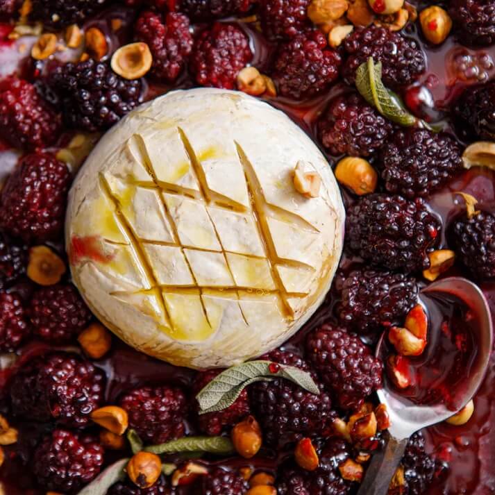 A close-up of a melting baked camembert
