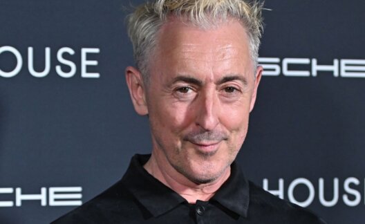 Vegan celebrity Alan Cumming on the red carpet