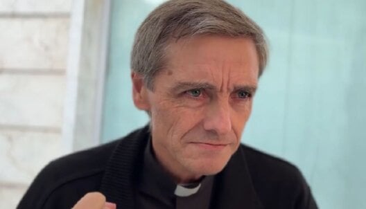 A screenshot of a Catholic priest from a video of Catholic priests defending bullfighting