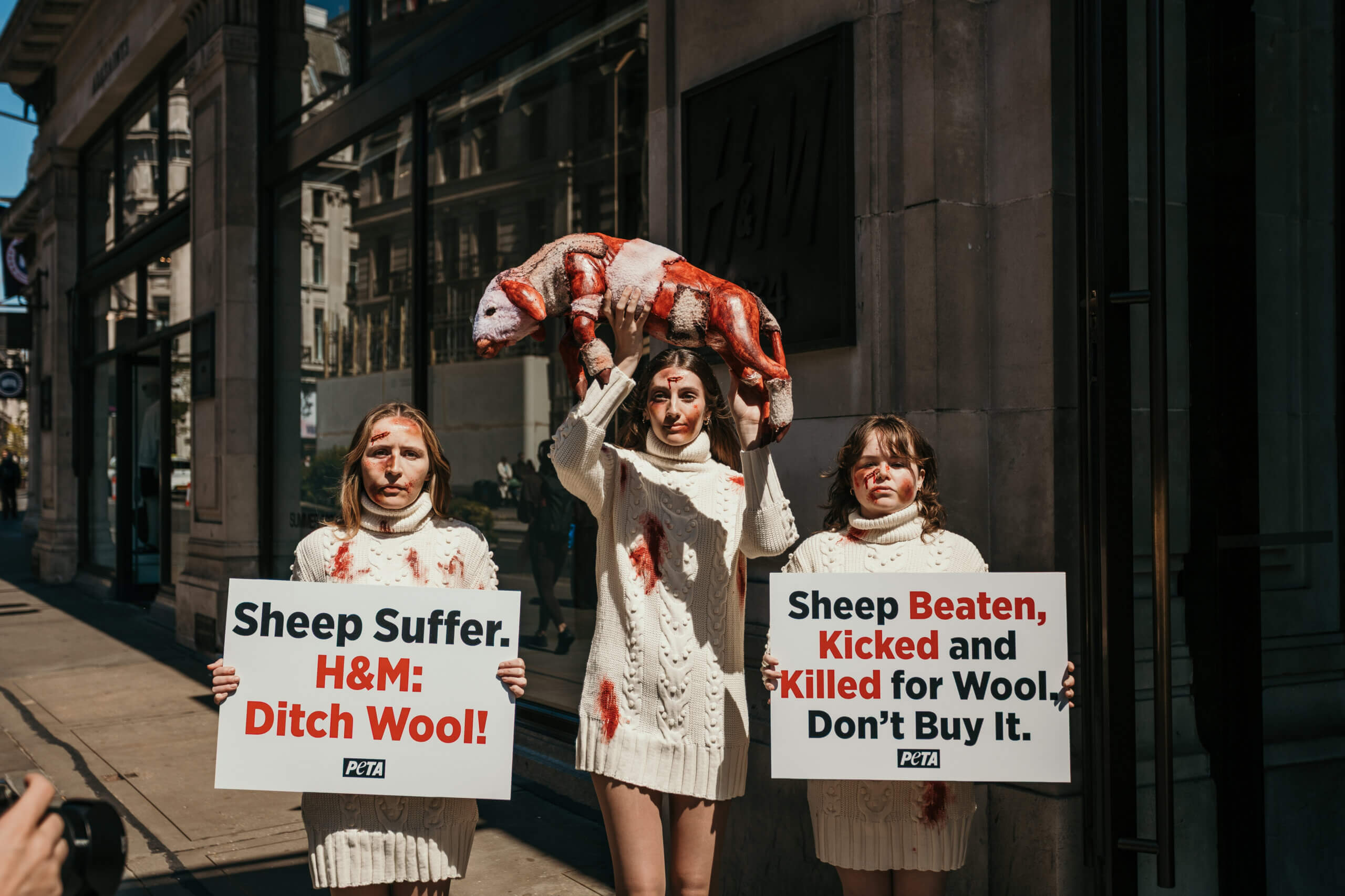 Animal Defenders Cradle 'Dead Lamb' Outside H&M's London Flagship