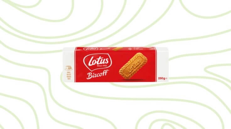 A packet of Biscoff biscuits in front of a green background