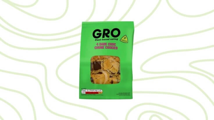 A packet of Co-Op dark choc chunk cookies in front of a green background